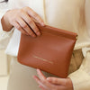 Key storage bag with automatic closure, light luxury and simple cosmetic bag, portable storage bag with elastic piece closure, mini bag